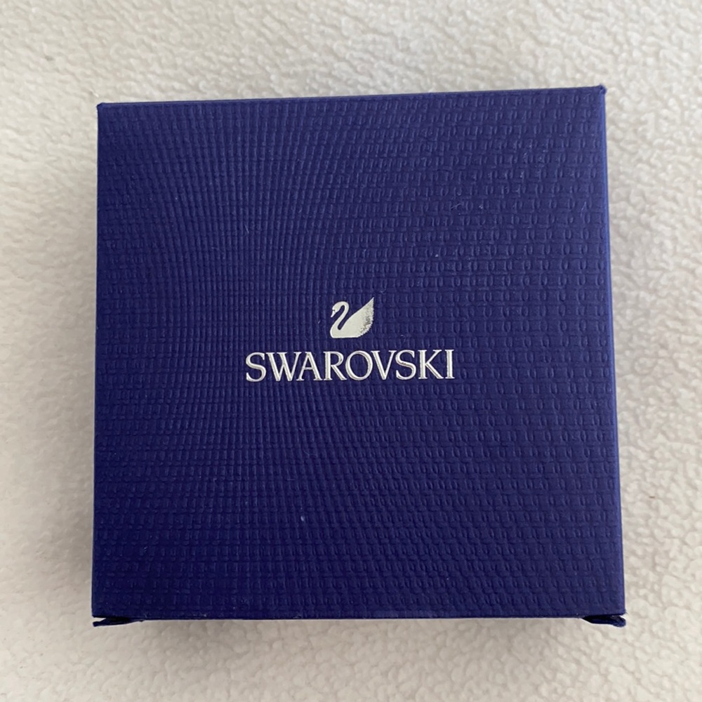 Swarovski earrings.